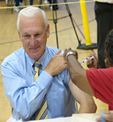 Supervisor Ron Roberts getting his flu vaccine