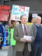 Jim Gogek, American Lung Association volunteer (left) and John Pierce, American Cancer Society volunteer (right) with supporters in the background. 
