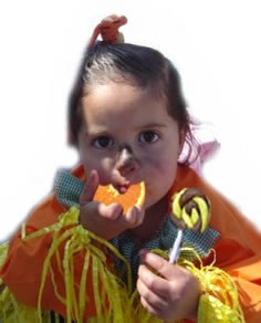 girl with candy and eating orange